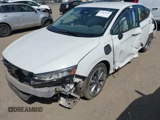 2019 Honda Clarity with VIN JHMZC5F1XKC007033, listed as a IAAI auction lot 42064611 with 28,458 mi miles. Bid and sale history available at carsss.com. Image 6.