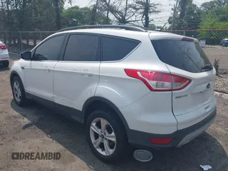 2013 Ford Escape SE z VIN 1FMCU9GXXDUD82847, wystawiony jako IAAI lot #42436360 z przebiegiem 142 071 mil mil oraz . Historia ofert i sprzedaży dostępna na DreamBid. Obrazek 3.