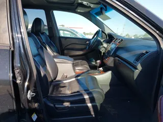 2004 Acura MDX with VIN 2HNYD18294H538551, listed as a IAAI auction lot 42153231 with 217,462 mi miles. Bid and sale history available at carsss.com. Image 5.