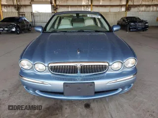 2004 Jaguar X-Type with VIN SAJEA51C14WE06627, listed as a Copart auction lot 54925735 with 107,756 mi miles and Clean Title. Bid and sale history available at DreamBid. Image 5.