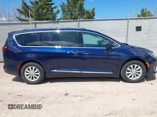 2017 Chrysler Pacifica Touring L with VIN 2C4RC1BG7HR514864, listed as a IAAI auction lot 42187845 with 86,774 mi miles and . Bid and sale history available at DreamBid. Image 13.