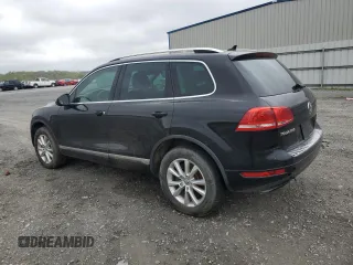 2014 Volkswagen Touareg Lux with VIN WVGEF9BP5ED005175, listed as a Copart auction lot 51815565 with 163,183 mi miles and Clean Title. Bid and sale history available at DreamBid. Image 2.