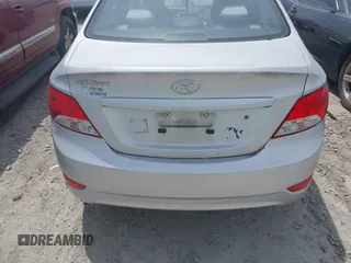 2013 Hyundai Accent GLS with VIN KMHCT4AE3DU403616, listed as a IAAI auction lot 42095208 with 128,523 mi miles. Bid and sale history available at carsss.com. Image 6.