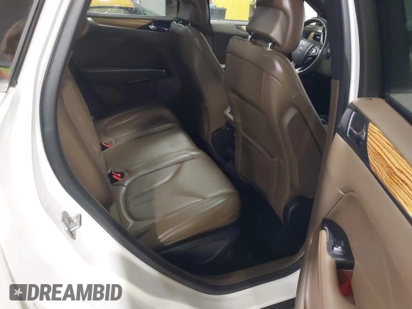 2016 Lincoln MKC Reserve with VIN 5LMTJ3DH2GUJ24052, listed as a IAAI auction lot 41666912 with 62,818 mi miles and . Bid and sale history available at DreamBid. Image 8.