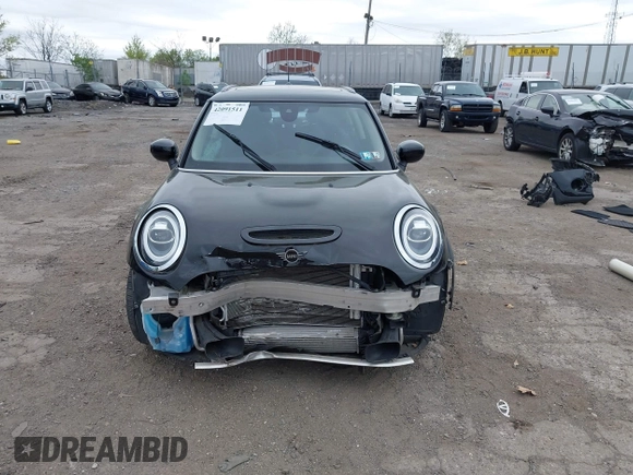 2020 MINI Hardtop Cooper S z VIN WMWXR5C00L2L44737, wystawiony jako IAAI lot #42091511 z przebiegiem 24 356 mil mil oraz . Historia ofert i sprzedaży dostępna na DreamBid. Obrazek 6.