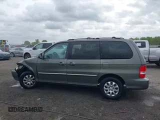 2005 Kia Sedona LX with VIN KNDUP132656734193, listed as a IAAI auction lot 41892342 with 91,768 mi miles. Bid and sale history available at carsss.com. Image 14.
