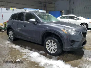 2014 Mazda CX-5 Touring with VIN JM3KE4CY6E0421738, listed as a Copart auction lot 45888885 with 103,693 mi miles and Salvage Title. Bid and sale history available at carsss.com. Image 4.