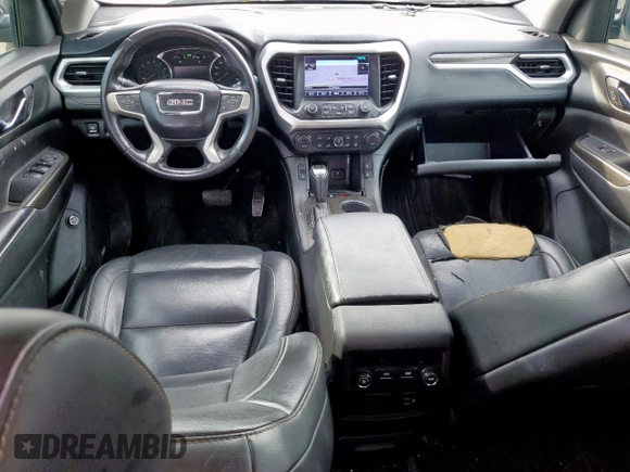 2018 GMC Acadia SLT with VIN 1GKKNMLAXJZ211715, listed as a Copart auction lot 61094385 with 106,929 mi miles and Salvage title. Bid and sale history available at DreamBid. Image 8.