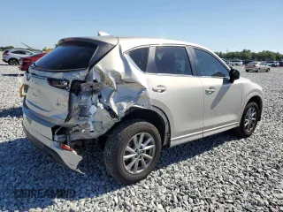 2024 Mazda CX-5 S Carbon Edition with VIN JM3KFBCL9R0434429, listed as a Copart auction lot 52990075 with 12,565 mi miles and Salvage Title. Bid and sale history available at DreamBid. Image 3.