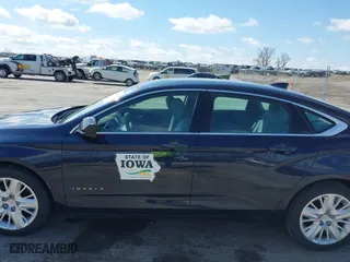 2017 Chevrolet Impala LS with VIN 2G11X5S38H9171819, listed as a IAAI auction lot 42080919 with 115,245 mi miles. Bid and sale history available at carsss.com. Image 14.