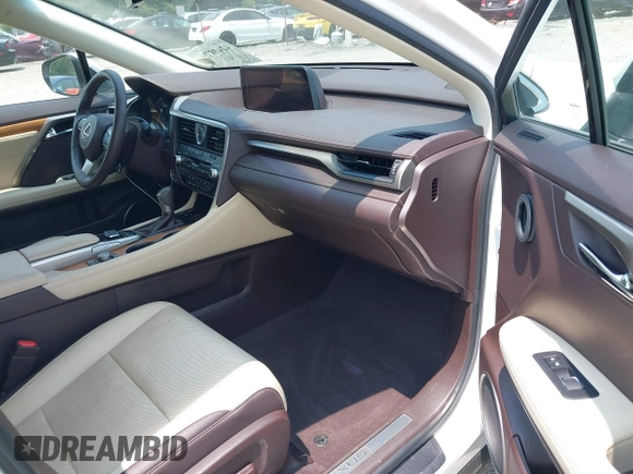 2019 Lexus RX 350 with VIN 2T2BZMCA7KC182763, listed as a IAAI auction lot 42418779 with 82,254 mi miles and . Bid and sale history available at DreamBid. Image 5.