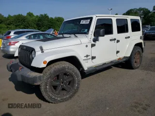 2013 Jeep Wrangler Unlimited Sport z VIN 1C4HJWDG9DL581643, wystawiony jako Copart lot #60775805 z przebiegiem 148 959 mil mil oraz Czysty tytuł • Clean title. Historia ofert i sprzedaży dostępna na DreamBid. Obrazek 1.