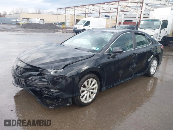 2019 Toyota Camry LE with VIN 4T1B11HK2KU263910, listed as a IAAI auction lot 42060008 with 31,433 mi miles and . Bid and sale history available at DreamBid. Image 17.