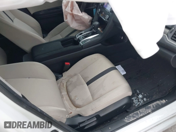 2020 Honda Civic LX with VIN 19XFC2F62LE021811, listed as a IAAI auction lot 41591466 with 75,797 mi miles and . Bid and sale history available at DreamBid. Image 5.