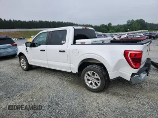 2021 Ford F-150 XL with VIN 1FTEW1C53MFB80059, listed as a Copart auction lot 58835805 with 85,998 mi miles and Salvage title. Bid and sale history available at DreamBid. Image 2.