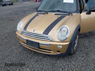 2005 MINI Hardtop with VIN WMWRC33555TK61361, listed as a IAAI auction lot 41940037 with 145,028 mi miles and . Bid and sale history available at DreamBid. Image 6.