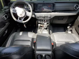 2024 Jeep Wrangler Sahara with VIN 1C4RJXP60RW116607, listed as a Copart auction lot 54562695 with 62,352 mi miles and Salvage title. Bid and sale history available at DreamBid. Image 8.