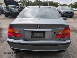 2005 BMW 3 Series 330i with VIN WBAEV53455KM42056, listed as a Copart auction lot 75910624 with 136,892 mi miles and Salvage Title. Bid and sale history available at carsss.com. Image 6.