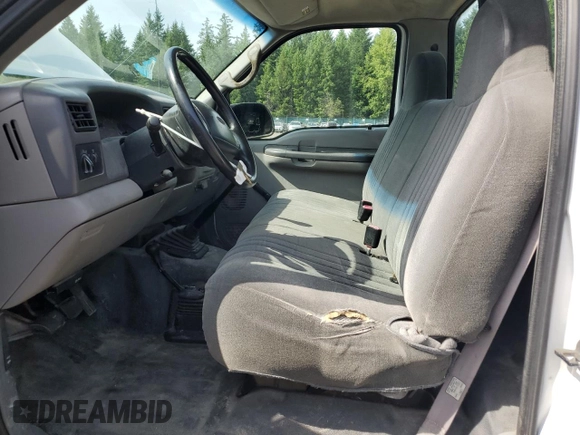 1999 Ford F-250 XL with VIN 1FTNF21F3XEC38845, listed as a Copart auction lot 60869825 with 327,518 mi miles and Clean title. Bid and sale history available at DreamBid. Image 7.