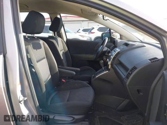 2010 Mazda 5 Sport with VIN JM1CR2W36A0388353, listed as a IAAI auction lot 42121004 with 169,658 mi miles. Bid and sale history available at carsss.com. Image 5.