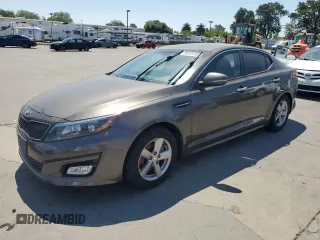 2015 Kia Optima LX z VIN 5XXGM4A74FG357520, wystawiony jako Copart lot #59724185 z przebiegiem 114 686 mil mil oraz Czysty tytuł • Clean title. Historia ofert i sprzedaży dostępna na DreamBid. Obrazek 1.