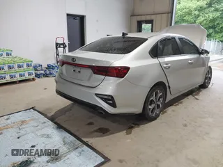 2021 Kia Forte LXS with VIN 3KPF24AD6ME326363, listed as a IAAI auction lot 42242056 with 149,367 mi miles and . Bid and sale history available at DreamBid. Image 4.