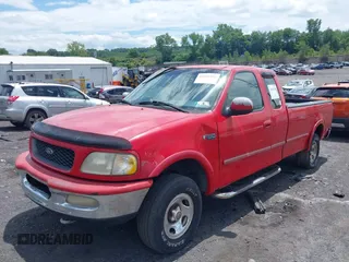 1997 Ford F-150 XL with VIN 1FTDX1869VNA11343, listed as a IAAI auction lot 42660458 with 105,924 mi miles and . Bid and sale history available at DreamBid. Image 2.