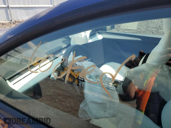 2024 Tesla Model Y Long Range with VIN 7SAYGAEEXRF983702, listed as a Copart auction lot 61536565 with Not provided miles and Salvage title. Bid and sale history available at DreamBid. Image 9.