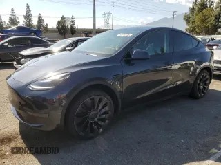 2024 Tesla Model Y with VIN 7SAYGDED7RF056973, listed as a Copart auction lot 55310705 with 15,391 mi miles and Salvage Title. Bid and sale history available at DreamBid. Image 1.