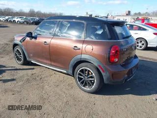 2015 MINI Countryman S z VIN WMWZC5C55FWP47826, wystawiony jako IAAI lot #41342674 z przebiegiem 94 683 mil mil oraz . Historia ofert i sprzedaży dostępna na DreamBid. Obrazek 3.