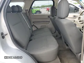 2009 Ford Escape XLS z VIN 1FMCU92789KB10338, wystawiony jako Copart lot #57452495 z przebiegiem 285 171 mil mil oraz Szkoda całkowita • Salvage title. Historia ofert i sprzedaży dostępna na DreamBid. Obrazek 11.