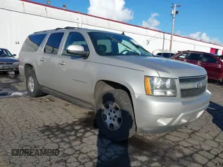 2009 Chevrolet Suburban LT w/2LT with VIN 1GNFC26099R177554, listed as a IAAI auction lot 38664519 with 311,063 mi miles. Bid and sale history available at carsss.com. Image 1.