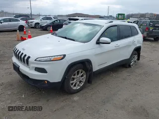 2015 Jeep Cherokee North with VIN 1C4PJMCS6FW564435, listed as a IAAI auction lot 41992440 with 166,048 mi miles. Bid and sale history available at carsss.com. Image 17.