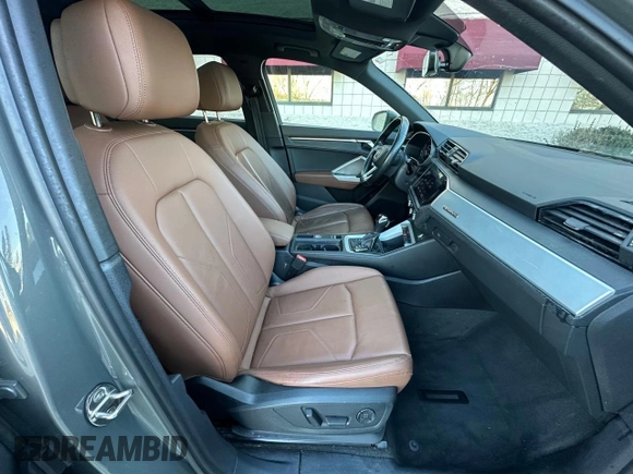 2021 Audi Q3 Premium z VIN WA1AUCF3XM1102363, wystawiony jako Copart lot #58672195 z przebiegiem 208 956 mil mil oraz Czysty tytuł • Clean title. Historia ofert i sprzedaży dostępna na DreamBid. Obrazek 5.