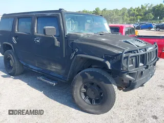 2003 Hummer H2 z VIN 5GRGN23UX3H140510, wystawiony jako IAAI lot #42325527 z przebiegiem 140 010 mil mil oraz . Historia ofert i sprzedaży dostępna na DreamBid. Obrazek 1.