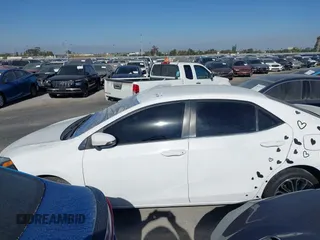 2016 Toyota Corolla L with VIN 5YFBURHEXGP400858, listed as a IAAI auction lot 40629280 with 139,409 mi miles and . Bid and sale history available at DreamBid. Image 14.