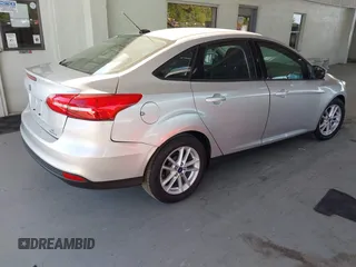 2016 Ford Focus SE with VIN 1FADP3F25GL317830, listed as a IAAI auction lot 42348499 with 8,679 mi miles and . Bid and sale history available at DreamBid. Image 4.
