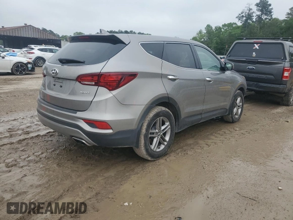 2017 Hyundai Santa Fe 2.4L z VIN 5NMZT3LBXHH038022, wystawiony jako Copart lot #51060545 z przebiegiem 63 790 mil mil oraz Szkoda całkowita • Salvage title. Historia ofert i sprzedaży dostępna na DreamBid. Obrazek 3.
