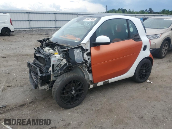 2016 Smart fortwo Passion with VIN WMEFJ5DA0GK060576, listed as a Copart auction lot 55641565 with 99,558 mi miles and Salvage title. Bid and sale history available at DreamBid. Image 1.