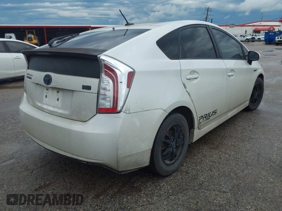 2014 Toyota Prius Four with VIN JTDKN3DU1E1764143, listed as a IAAI auction lot 42189738 with 209,835 mi miles and . Bid and sale history available at DreamBid. Image 4.