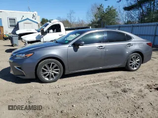 2016 Lexus ES 300h with VIN JTHBW1GGXG2101060, listed as a Copart auction lot 52021234 with 121,723 mi miles and Clean title. Bid and sale history available at DreamBid. Image 1.
