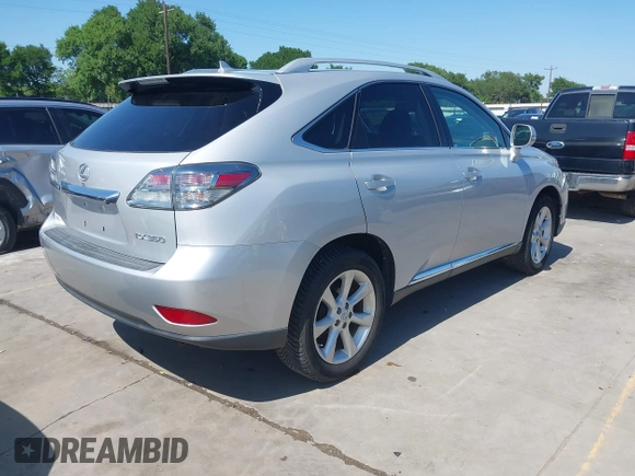 2012 Lexus RX 350 with VIN 2T2BK1BA0CC130560, listed as a IAAI auction lot 41973072 with 106,209 mi miles. Bid and sale history available at carsss.com. Image 4.