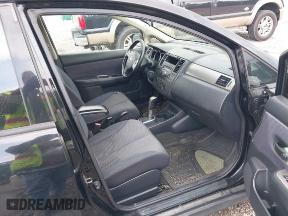 2009 Nissan Versa 1.8 S with VIN 3N1BC13E79L354341, listed as a IAAI auction lot 42079896 with 118,797 mi miles. Bid and sale history available at carsss.com. Image 5.