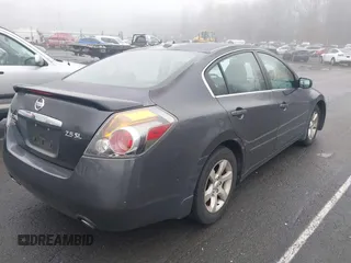 2009 Nissan Altima S with VIN 1N4AL21E29N516285, listed as a IAAI auction lot 41922561 with 156,740 mi miles and . Bid and sale history available at DreamBid. Image 4.