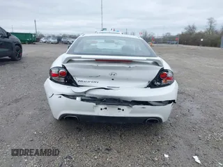 2008 Hyundai Tiburon GS z VIN KMHHM66D58U283273, wystawiony jako IAAI lot #41900097 z przebiegiem 154 013 mil mil oraz . Historia ofert i sprzedaży dostępna na DreamBid. Obrazek 17.