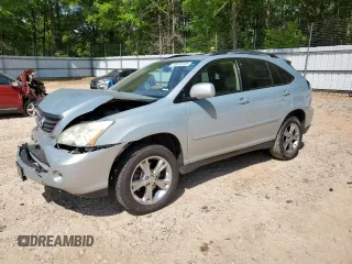 2006 Lexus RX 400h with VIN JTJGW31U460004672, listed as a Copart auction lot 53619175 with 174,053 mi miles and Salvage title. Bid and sale history available at DreamBid. Image 1.