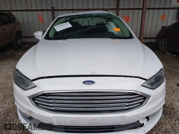 2017 Ford Fusion Hybrid Titanium with VIN 3FA6P0RU1HR322997, listed as a IAAI auction lot 41506630 with 263,589 mi miles and . Bid and sale history available at DreamBid. Image 12.