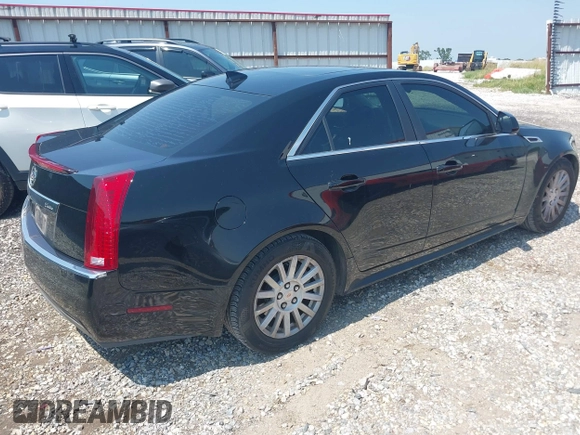 2013 Cadillac CTS Luxury with VIN 1G6DE5E55D0118722, listed as a IAAI auction lot 42448616 with 131,906 mi miles and . Bid and sale history available at DreamBid. Image 4.