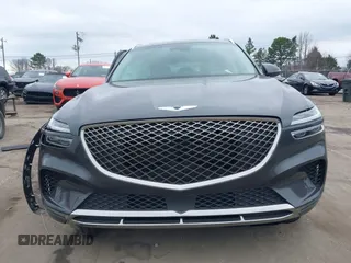 2022 Genesis GV70 2.5T with VIN KMUMADTB2NU059678, listed as a IAAI auction lot 41479833 with 30,598 mi miles and . Bid and sale history available at DreamBid. Image 12.