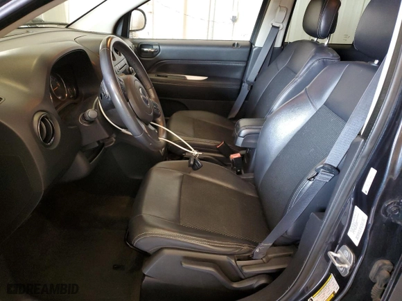 2014 Jeep Compass Latitude with VIN 1C4NJDEB1ED665042, listed as a Copart auction lot 53981545 with 171,299 mi miles and Clean Title. Bid and sale history available at carsss.com. Image 7.